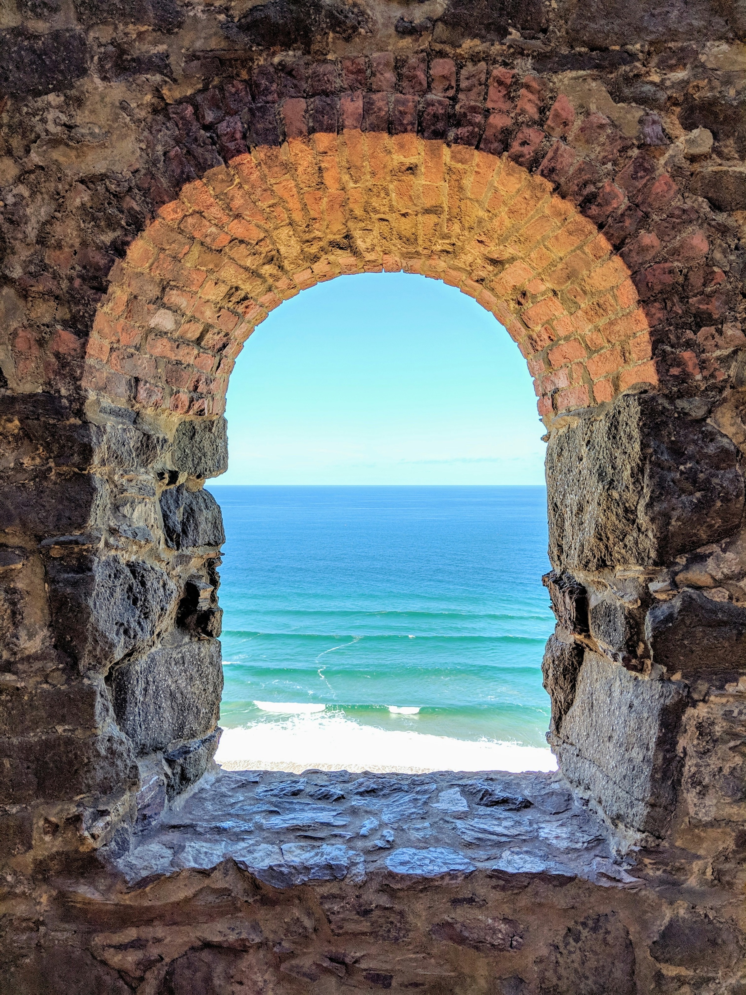 A Kernara guide leading a private guest along the coast path