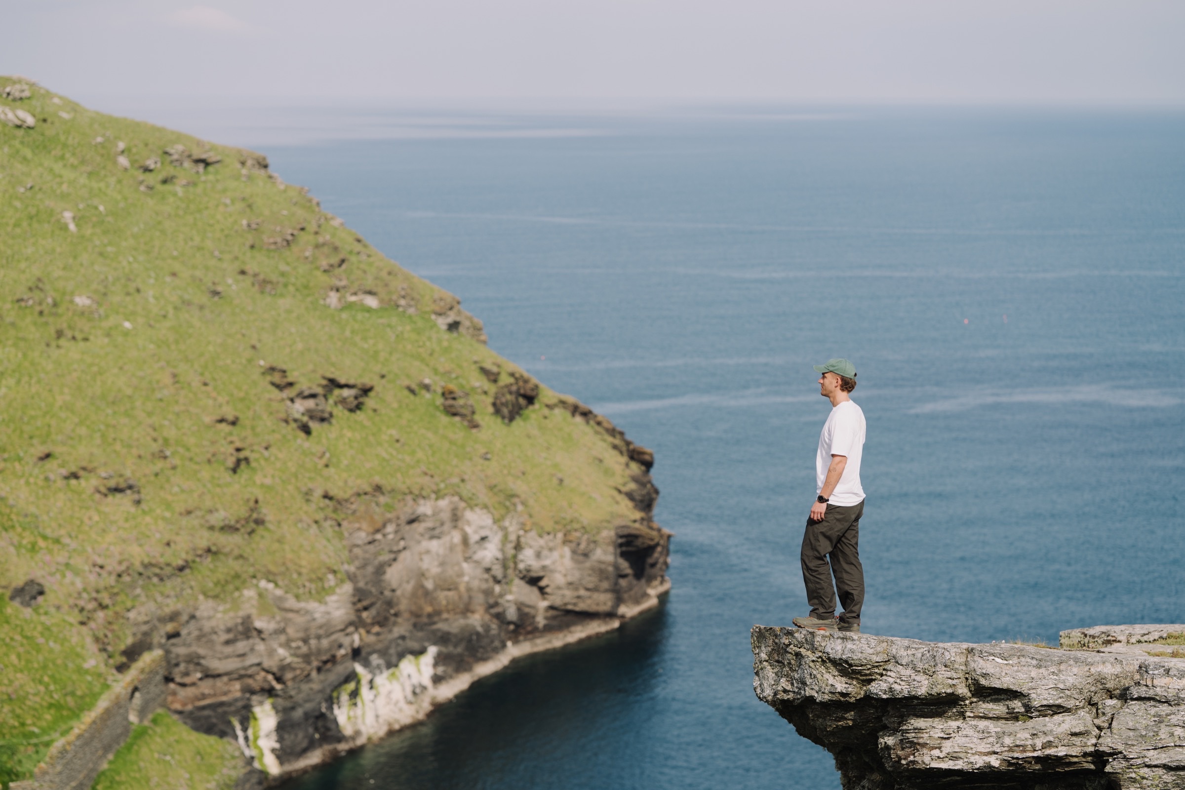 Golden beach and dramatic Cornish cliffs